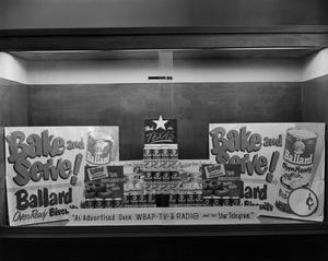 [Photograph of Ballard Oven Ready Biscuits window display]