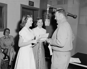 [Doc Ruhman recording with two women]