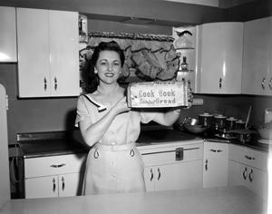 [Photo of Margaret McDonald advertising Cook Book bread]