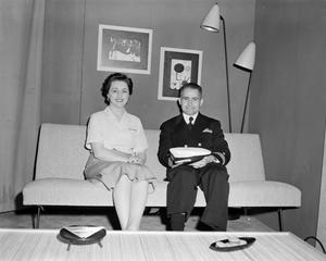 [Margaret McDonald and a guest in his Marine uniform]