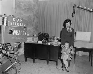 [Woman and child in advertisement]