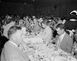 [Doc Rhuman and other attendees of a banquet]