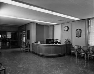 [Photo of hall and reception]