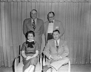 [Margaret McDonald posing with three guests]