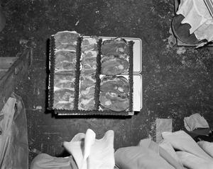 [Photo of meat display]