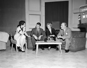 [Photo of Ann Alden and three guests]