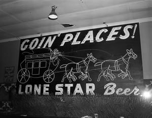 [Lone Star Beer sign]