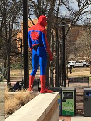 [UNT Spider-Man standing on ledge near Union]