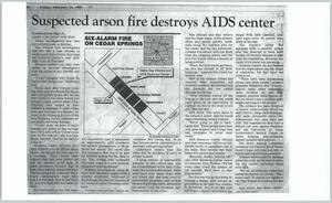 [Clipping: Suspected arson fire destroys AIDS center]