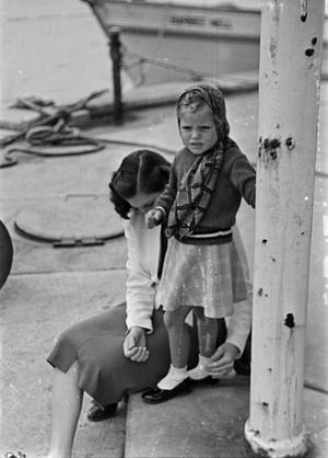 [Photograph of Doris Stiles and Carol Williams on a dock, 2]