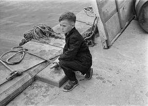 [Photograph of Tim Williams on a dock]