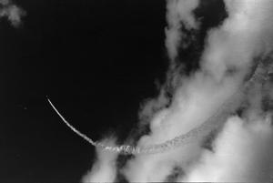 [Photograph of a jet in the sky]