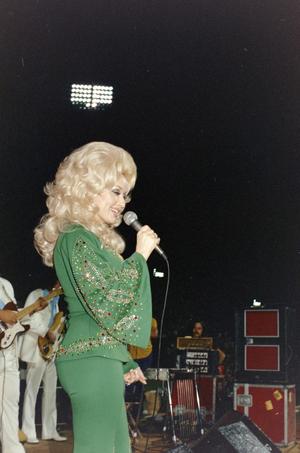 [Dolly Parton performing at WBAP's Country Gold 1974 anniversary event]