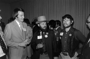 [Photograph of Frank Healer and others at KXAS Party]