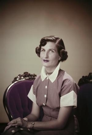 [Photograph of Doris Stiles Williams posing on a couch, 5]