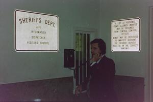 Primary view of object titled '[Russ Bloxom in courthouse, 14]'.