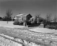 Photograph: [Photograph of a large house covered in snow]