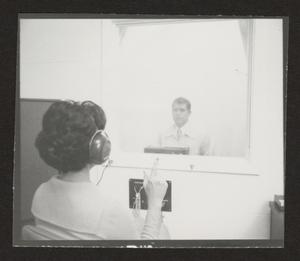 [Woman participates in a hearing evaluation, 2]