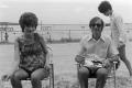 Thumbnail image of item number 1 in: '[Adults sitting by the beach]'.