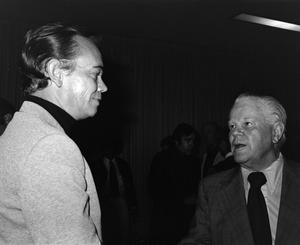 [Photograph of James Byron talking with Bill Mack at his retirement party]