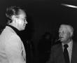 Photograph: [Photograph of James Byron talking with Bill Mack at his retirement p…