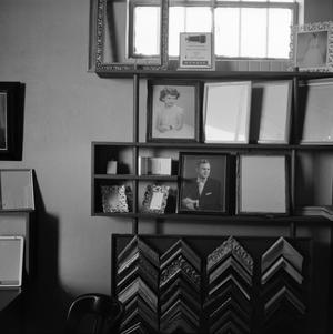 [Photograph of a picture frame display]