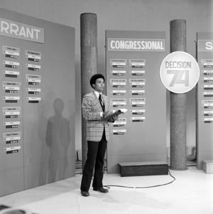 [Photograph of an Willie Monroe on the KXAS-TV set during an election]