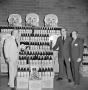 Primary view of [Men celebrating Pearl Beer products]