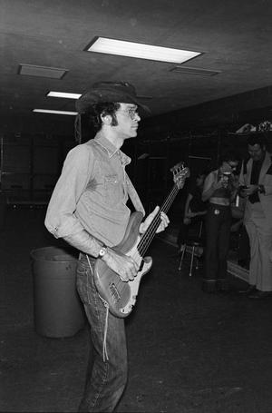 [Man playing an electric guitar at the 1974 Country Gold Anniversary]