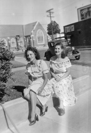 [Photograph of Doris Stiles Williams and another women posing in dresses]