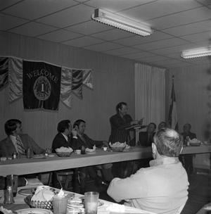 [Man speaking at a Lions Club meeting]