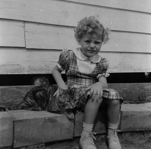 [Photograph of Carol Williams with a cat]