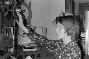 [Photograph of Gaye Smith working in a radio studio, 2]