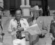 Primary view of [Bill Mack and Sheriff Low Evans in front of the Tarrant County Courthouse, 2]
