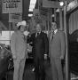 Photograph: [Bob Hope standing between two men]
