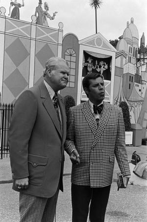 [Jerry Lewis standing with a man]