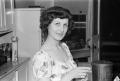 Photograph: [Photograph of Doris Stiles Williams in a kitchen]