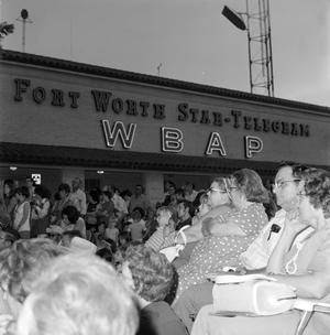 [Crowd in front of the WBAP building]