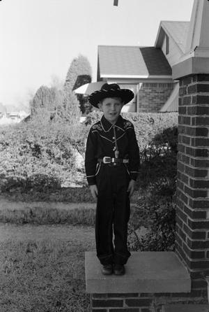 [Photograph of Tim Williams dressed as a cowboy]