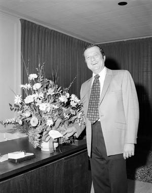 [Photograph of Harold Taft and rodeo bouquet]