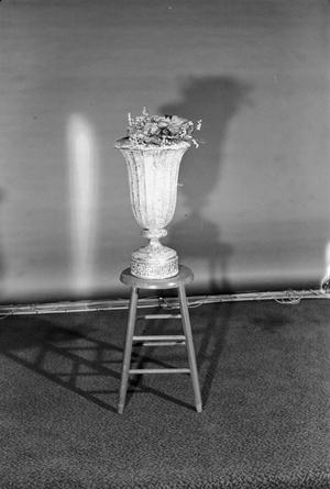 [Photograph of a vase on a stool, 2]