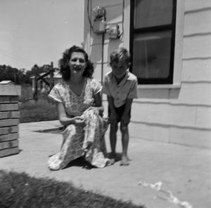 [Photograph of Doris Stiles Williams and Tim Williams posing outside]