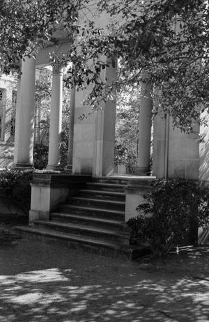 [Photograph of a staircase leading to a portico]