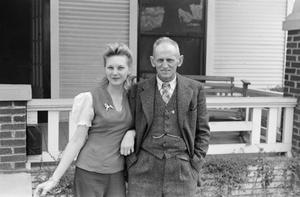 [Photograph of Frances and Byrd Williams Jr posing in front of a house]