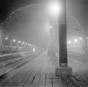 [Photograph of a train at an empty train station]
