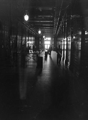 [Photograph of a hallway in a building]