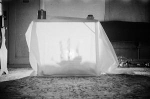 [Photograph of a box covered in cloth]