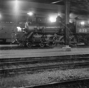 [Photograph of a train engine on the tracks]