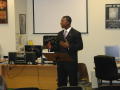Image: [Man in a suit presenting during 2006 BHM]