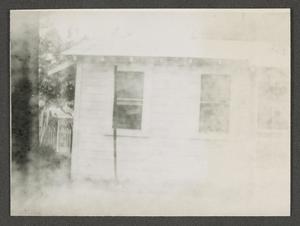 [A light-colored house]